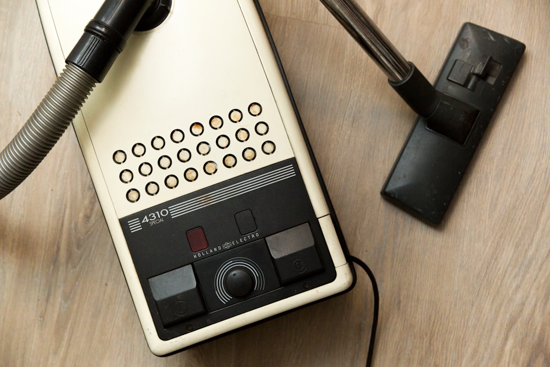 old dutch miele vacuum cleaner on wooden floor